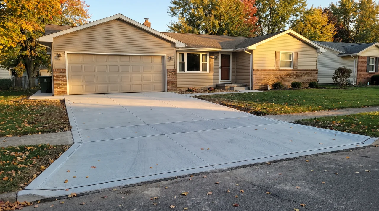 New broom-finish concrete driveway, residential Buffalo neighborhood